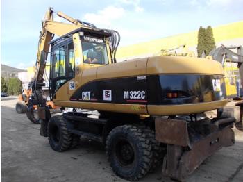 Mobilbagger Caterpillar M322 C: das Bild 1