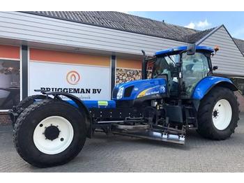 Traktor New Holland T 6010 + Bos wegenschaaf: das Bild 1