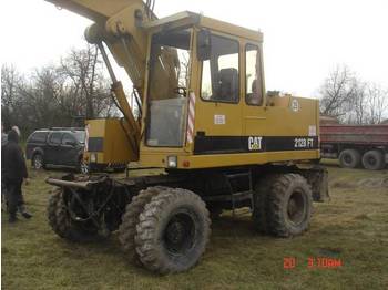 Mobilbagger Caterpillar 212 BFT: das Bild 1