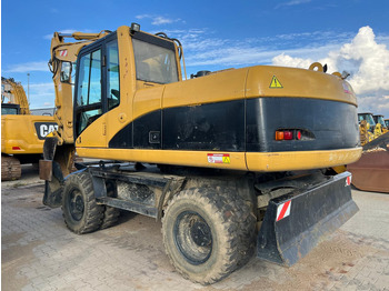 CATERPILLAR M318 Bagger