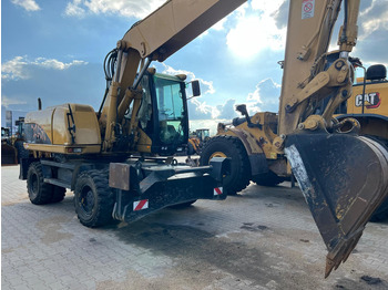 Bagger Caterpillar M318C: das Bild 2