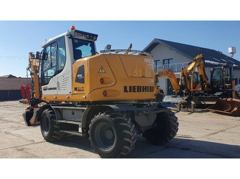 Mobilbagger Liebherr A 912 compact: das Bild 2