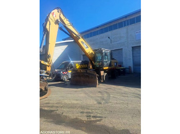 CATERPILLAR M318D Bagger