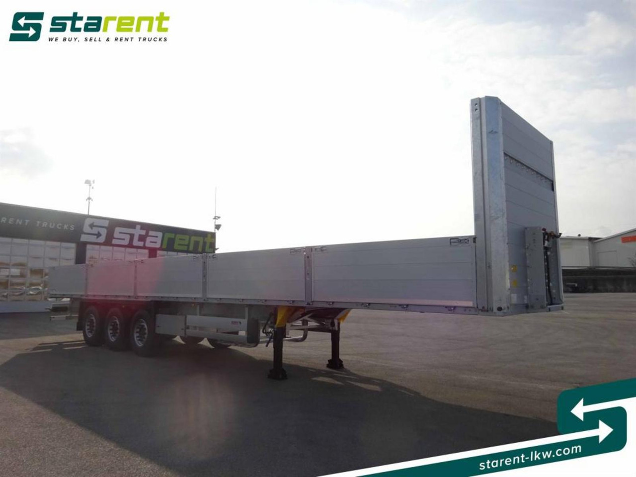 Schmitz Baustofftrailer Liftachse Rungen 80cm Bordwände - Pritschenauflieger/ Plattformauflieger: das Bild 3 Schmitz Baustofftrailer Liftachse Rungen 80cm Bordwände - Pritschenauflieger/ Plattformauflieger: das Bild 3