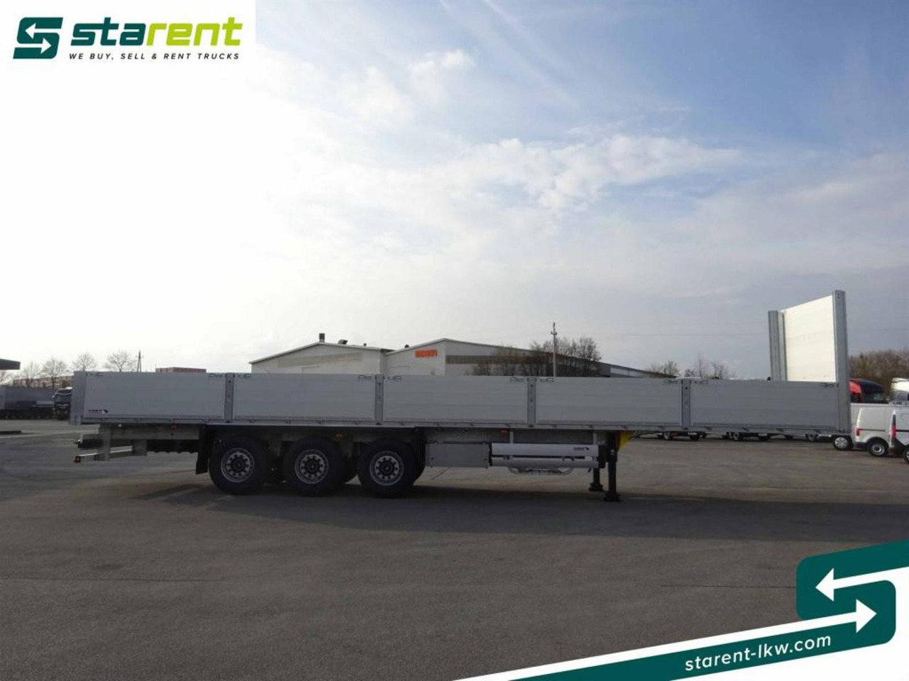 Schmitz Baustofftrailer Liftachse Rungen 80cm Bordwände - Pritschenauflieger/ Plattformauflieger: das Bild 4 Schmitz Baustofftrailer Liftachse Rungen 80cm Bordwände - Pritschenauflieger/ Plattformauflieger: das Bild 4