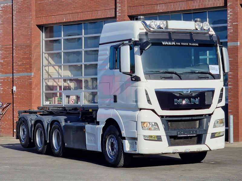 MAN TGX 32.560 8x4*4 - Cable system - Retarder - Euro 6 - Steering axle - - Seil Abrollkipper: das Bild 1 MAN TGX 32.560 8x4*4 - Cable system - Retarder - Euro 6 - Steering axle - - Seil Abrollkipper: das Bild 1
