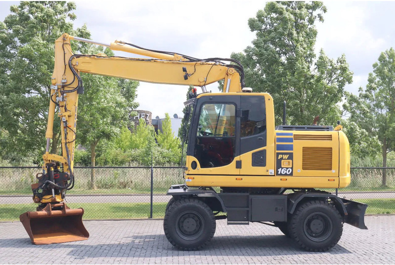 Komatsu PW 160-10 | ROTOTILT | NEW TIRES - Mobilbagger: das Bild 1 Komatsu PW 160-10 | ROTOTILT | NEW TIRES - Mobilbagger: das Bild 1