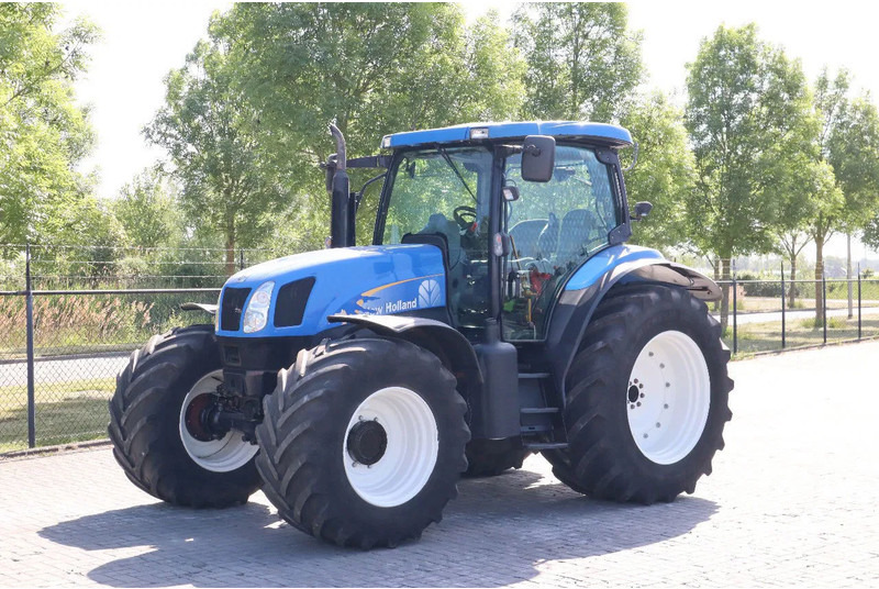 New Holland TS135A | 40 KM/H | 4X4 | SUPERSTEER - Traktor: das Bild 1 New Holland TS135A | 40 KM/H | 4X4 | SUPERSTEER - Traktor: das Bild 1