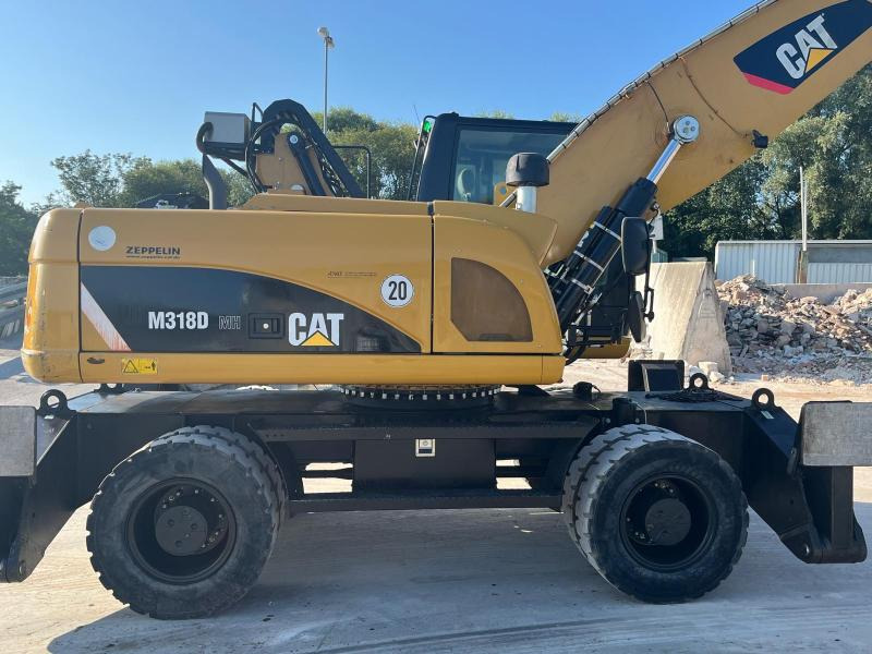 Caterpillar M318D MH - Umschlagbagger: das Bild 4 Caterpillar M318D MH - Umschlagbagger: das Bild 4
