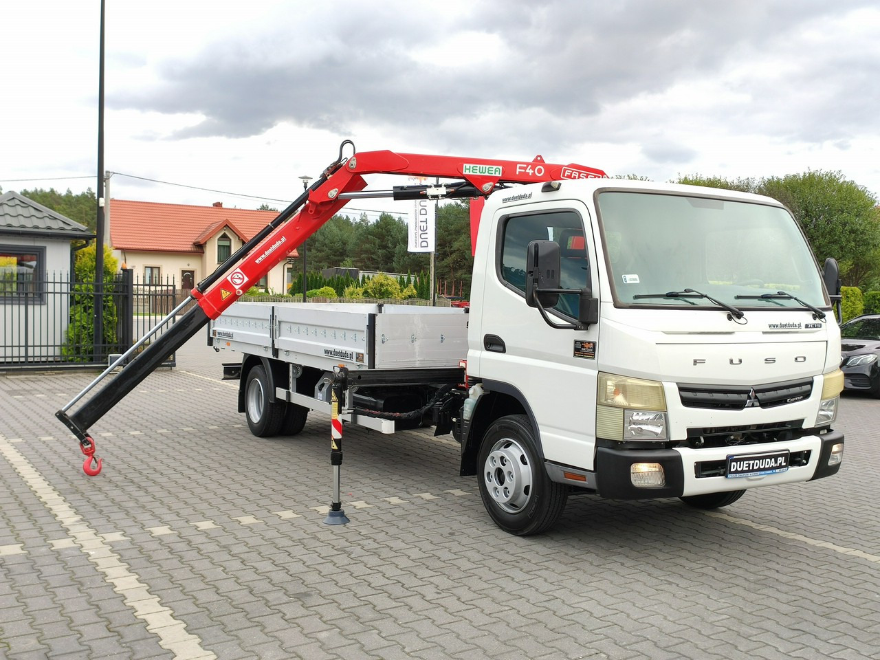 Mitsubishi Canter Fuso 7C15 3.0/150KM HDS FASSI F40 UNIKAT Super Stan !!! - Pritsche LKW, Autokran: das Bild 1 Mitsubishi Canter Fuso 7C15 3.0/150KM HDS FASSI F40 UNIKAT Super Stan !!! - Pritsche LKW, Autokran: das Bild 1