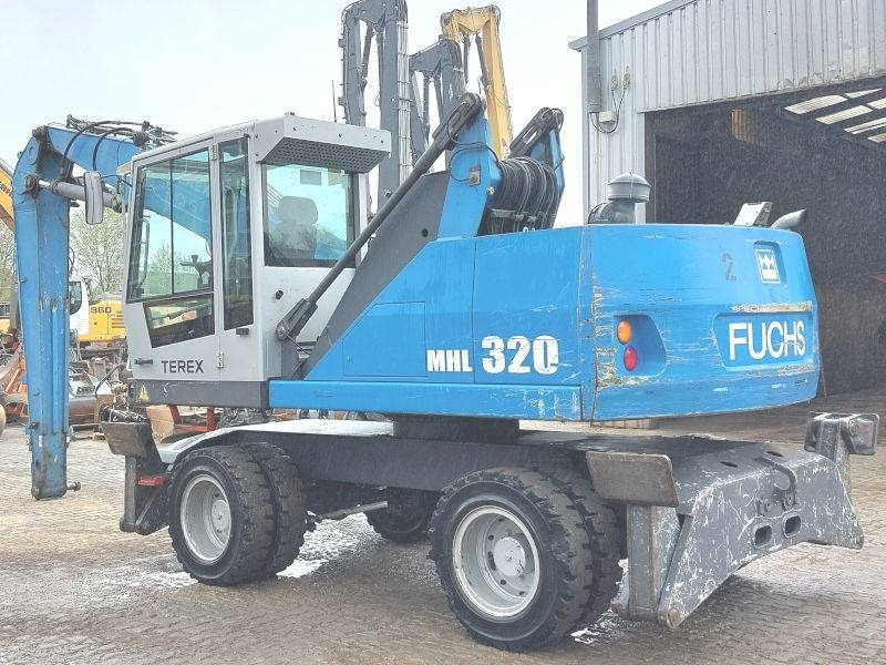 Fuchs MHL 320 D - Umschlagbagger: das Bild 3 Fuchs MHL 320 D - Umschlagbagger: das Bild 3