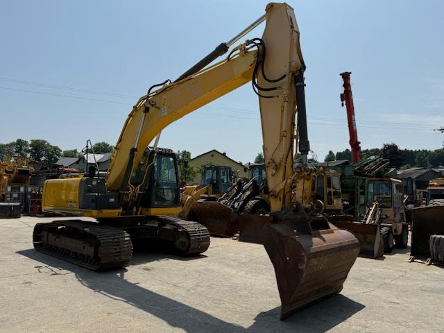 New Holland Kobelco E 215 C - Kettenbagger: das Bild 2 New Holland Kobelco E 215 C - Kettenbagger: das Bild 2