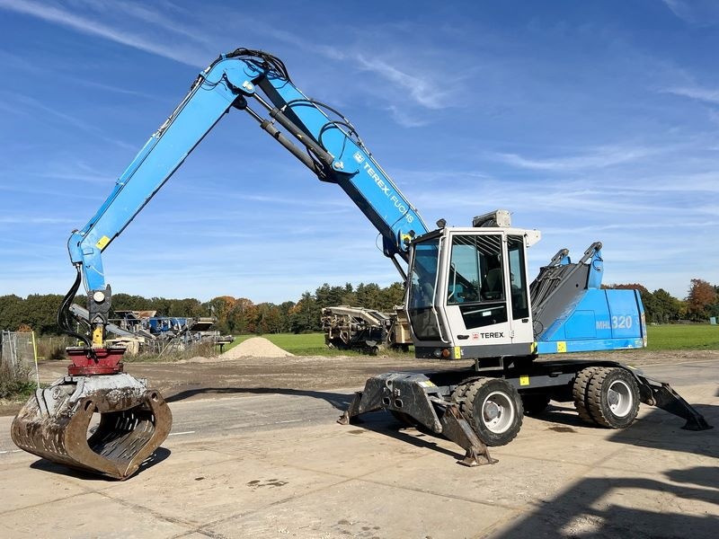 Terex Fuchs MHL 320 - Umschlagbagger: das Bild 2 Terex Fuchs MHL 320 - Umschlagbagger: das Bild 2