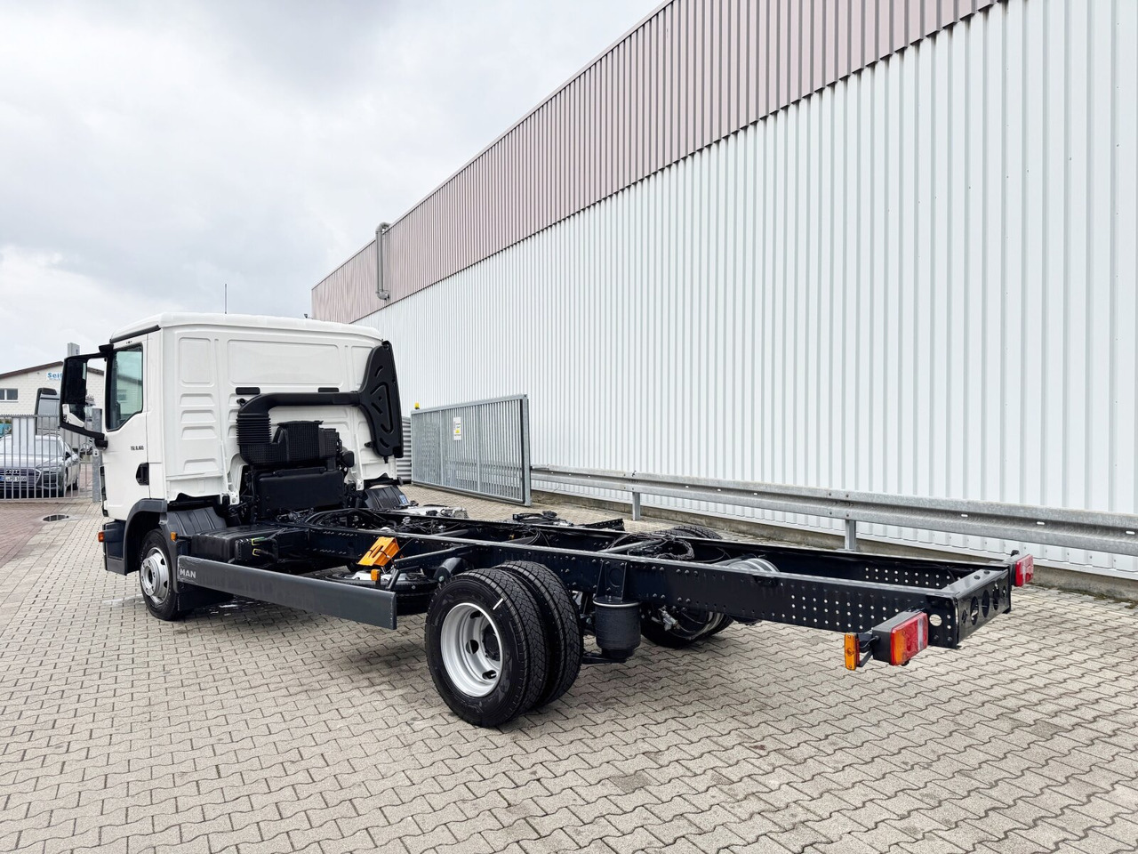 Abrollkipper, Zustand - NEU MAN TGL 8.160 4x2 BL CH TGL 8.160 4x2 BL CH, City-Abroller: das Bild 12