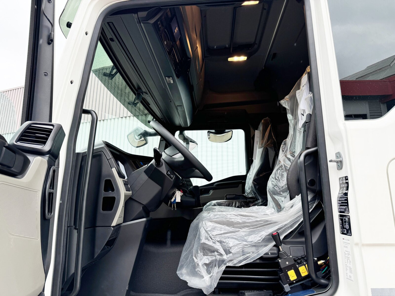 MAN TGS 26.470 6x2-4 LL CH TGS 26.470 6x2-4 LL CH, Retarder, Navi, Lenk-/Liftachse - Abrollkipper: das Bild 3 MAN TGS 26.470 6x2-4 LL CH TGS 26.470 6x2-4 LL CH, Retarder, Navi, Lenk-/Liftachse - Abrollkipper: das Bild 3