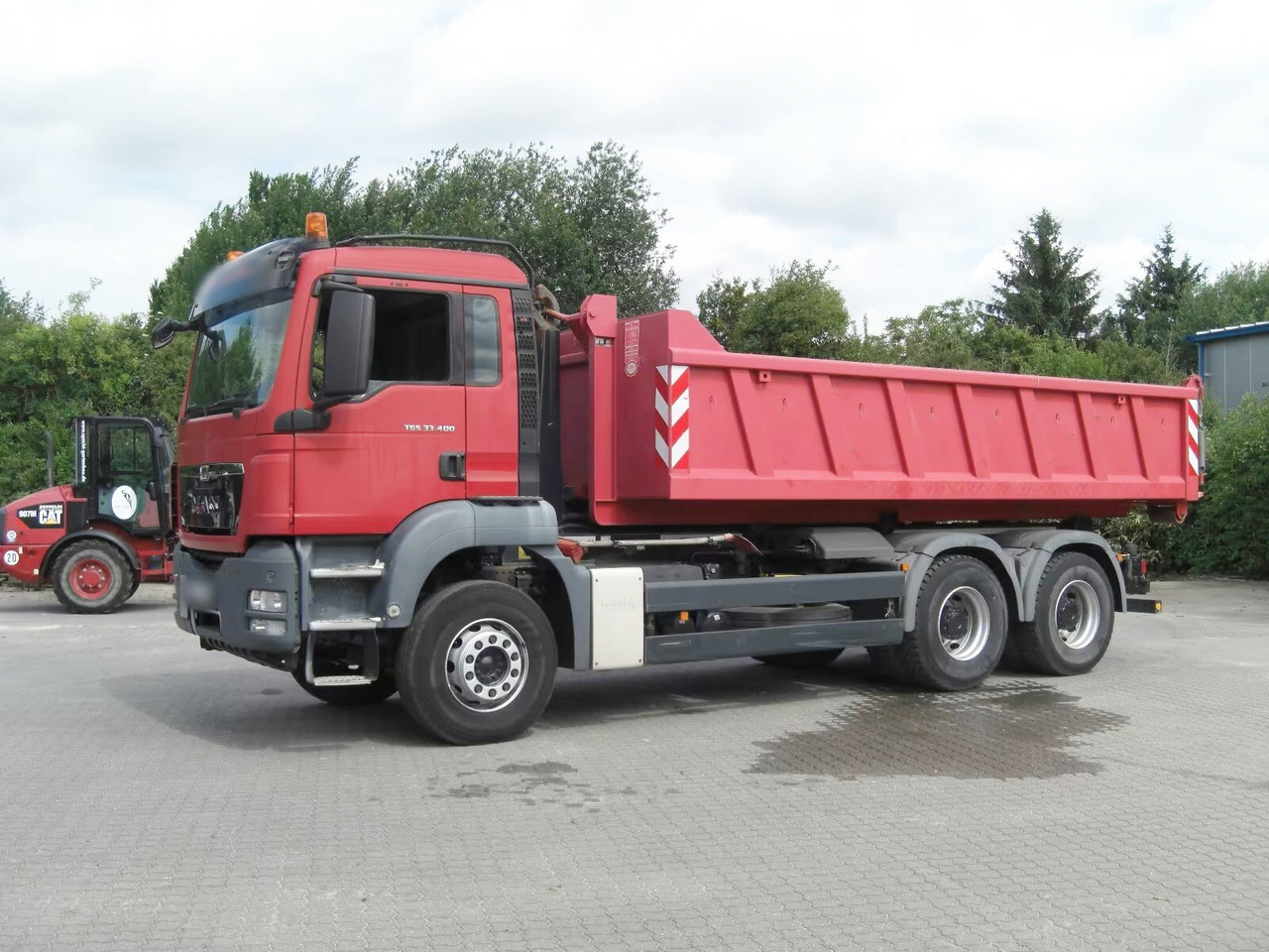 MAN TGS 33.400 6x4 BL TGS 33.400 6x4 BL - Abrollkipper: das Bild 4 MAN TGS 33.400 6x4 BL TGS 33.400 6x4 BL - Abrollkipper: das Bild 4