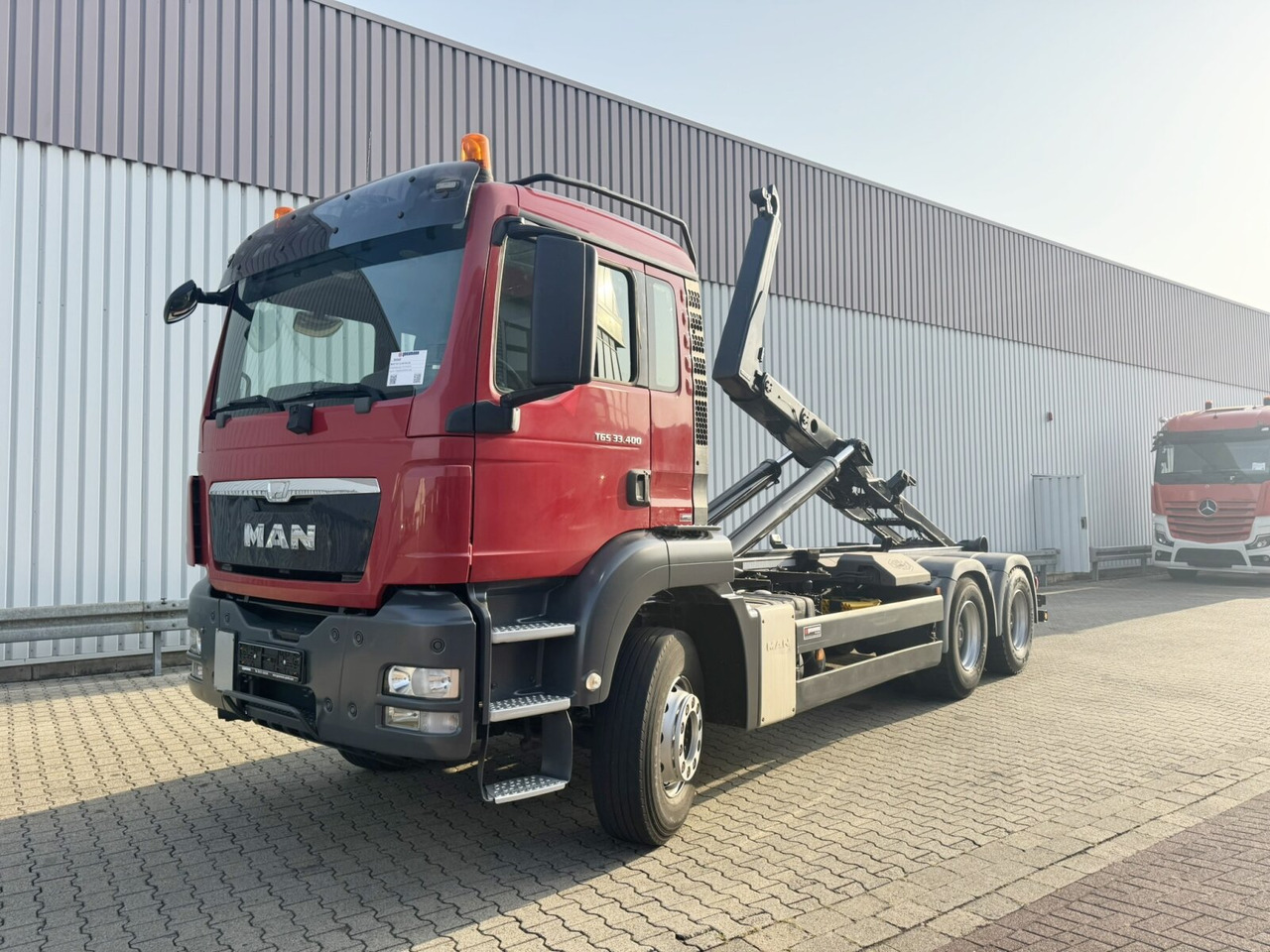 MAN TGS 33.400 6x4 BL TGS 33.400 6x4 BL, Navi - Abrollkipper: das Bild 1 MAN TGS 33.400 6x4 BL TGS 33.400 6x4 BL, Navi - Abrollkipper: das Bild 1