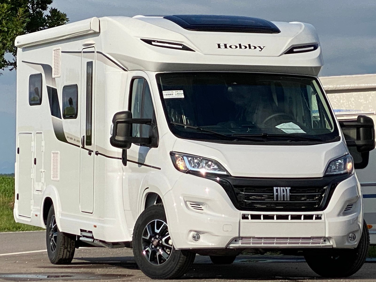 Hobby Optima De Luxe T65 GE Modell 2024 - Teilintegriertes Wohnmobil: das Bild 1 Hobby Optima De Luxe T65 GE Modell 2024 - Teilintegriertes Wohnmobil: das Bild 1