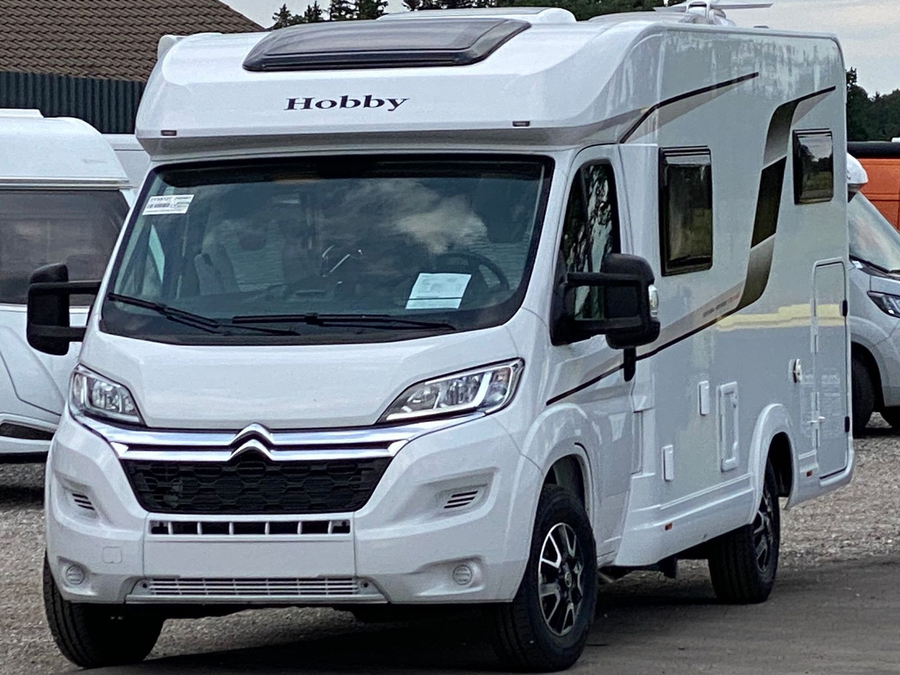 Hobby Optima Ontour Edition V65 GE Navi Markise SAT - Teilintegriertes Wohnmobil: das Bild 1 Hobby Optima Ontour Edition V65 GE Navi Markise SAT - Teilintegriertes Wohnmobil: das Bild 1