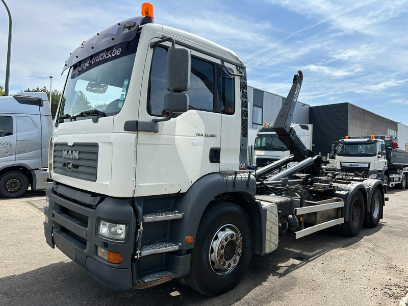MAN TGA 33.360 6x4 HOOKLIFT - MANUAL ZF - BIG AXLES HUB REDUCTION / STEEL SPRING - BE TRUCK - Abrollkipper: das Bild 3 MAN TGA 33.360 6x4 HOOKLIFT - MANUAL ZF - BIG AXLES HUB REDUCTION / STEEL SPRING - BE TRUCK - Abrollkipper: das Bild 3