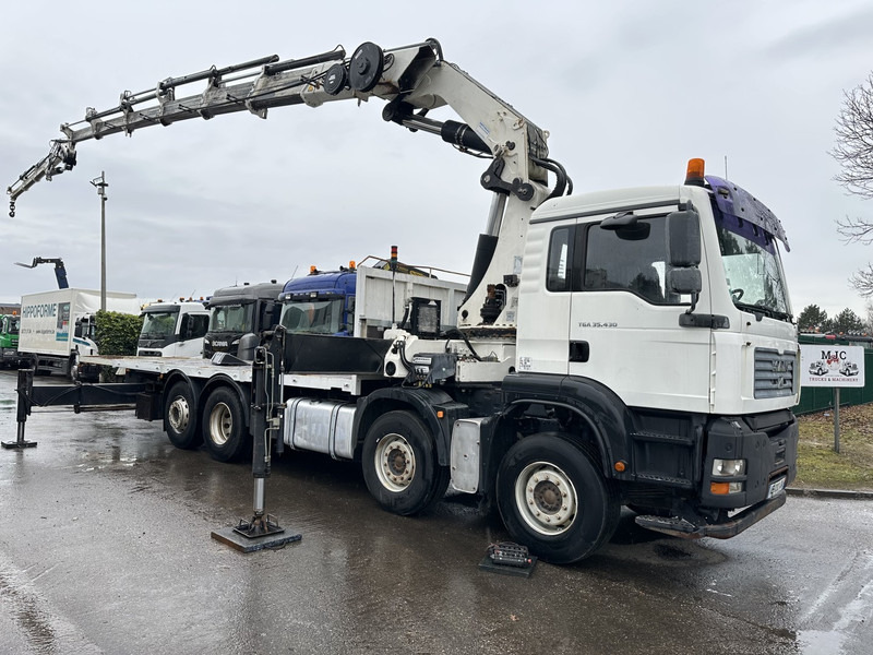MAN TGA 35.430 8x2 + KRAN HIAB 700 E-6 + JIB 165X-3 - RETARDER - PRITSCHE 6m70~8m50 EXTENDABLE - MANUAL GEARBOX ZF - LIFT + STEERING AXLE - Pritsche LKW, Autokran: das Bild 1 MAN TGA 35.430 8x2 + KRAN HIAB 700 E-6 + JIB 165X-3 - RETARDER - PRITSCHE 6m70~8m50 EXTENDABLE - MANUAL GEARBOX ZF - LIFT + STEERING AXLE - Pritsche LKW, Autokran: das Bild 1