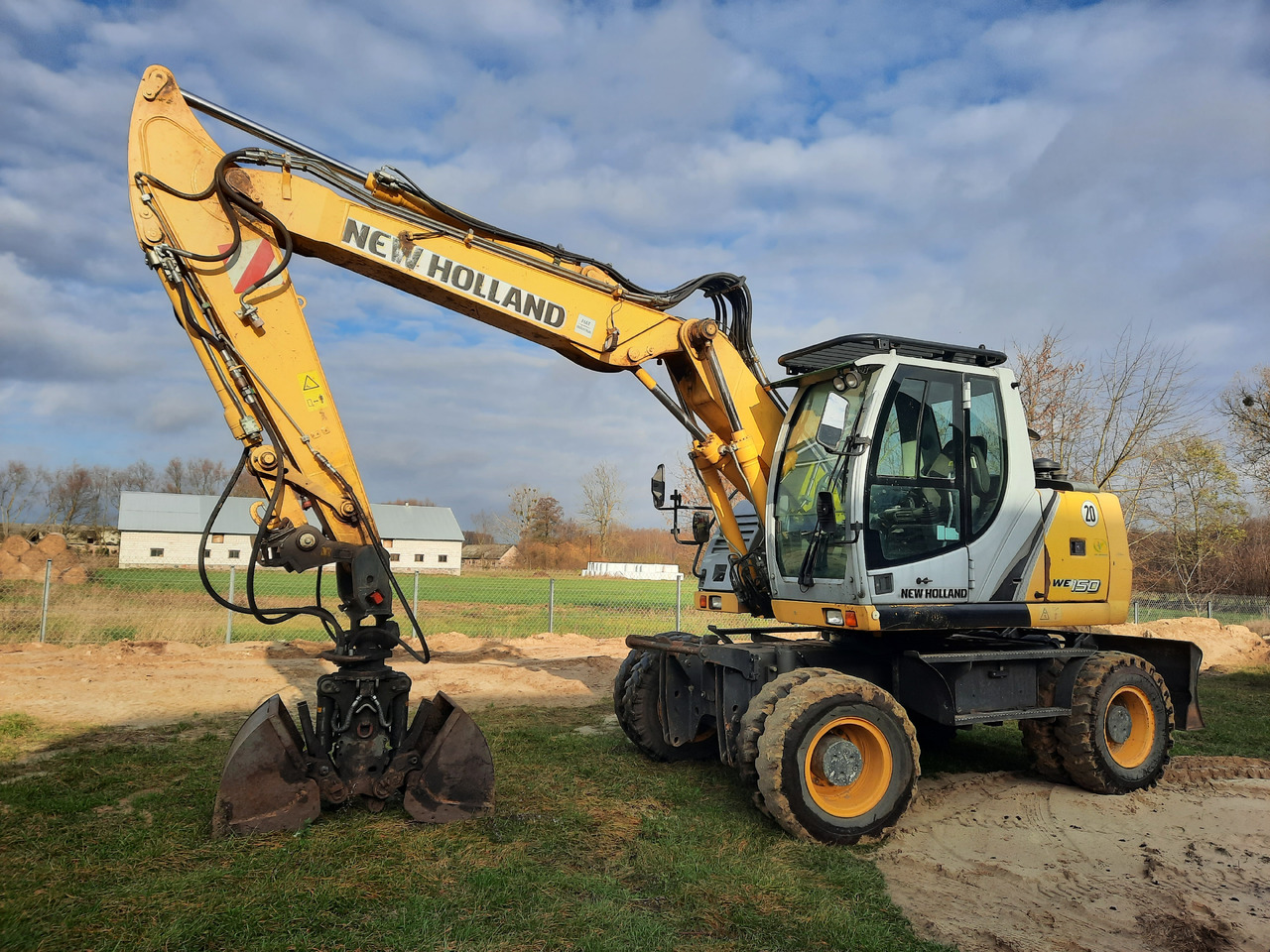NEW HOLLAND WE150C - Mobilbagger: das Bild 1 NEW HOLLAND WE150C - Mobilbagger: das Bild 1