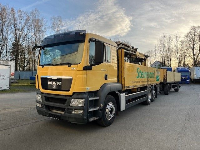 MAN TGS 26.400 Baustoff LKW mit Ladekran Atlas 210.2 - Pritsche LKW, Autokran: das Bild 1 MAN TGS 26.400 Baustoff LKW mit Ladekran Atlas 210.2 - Pritsche LKW, Autokran: das Bild 1