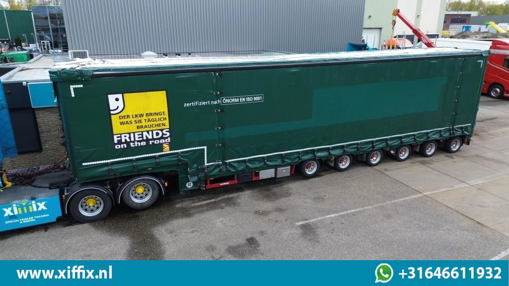 Meusburger 6-ass. Semi dieplader met elektische huifopbouw / 3x naloop gestuurd - Tieflader Auflieger: das Bild 1 Meusburger 6-ass. Semi dieplader met elektische huifopbouw / 3x naloop gestuurd - Tieflader Auflieger: das Bild 1