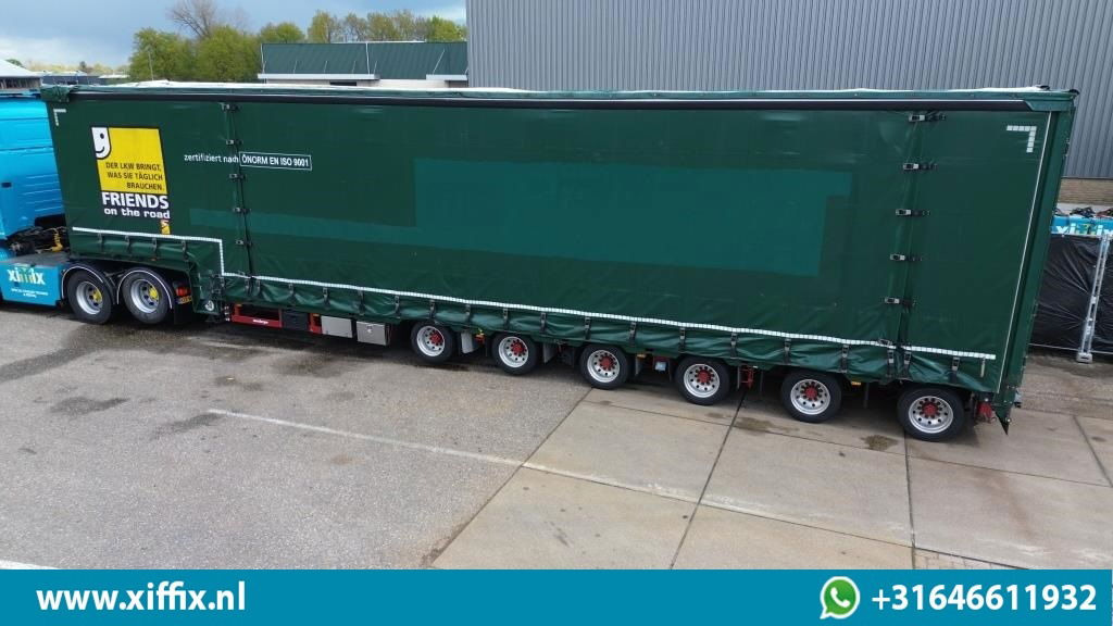 Meusburger 6-ass. Semi dieplader met elektische huifopbouw / 3x naloop gestuurd - Tieflader Auflieger: das Bild 2 Meusburger 6-ass. Semi dieplader met elektische huifopbouw / 3x naloop gestuurd - Tieflader Auflieger: das Bild 2