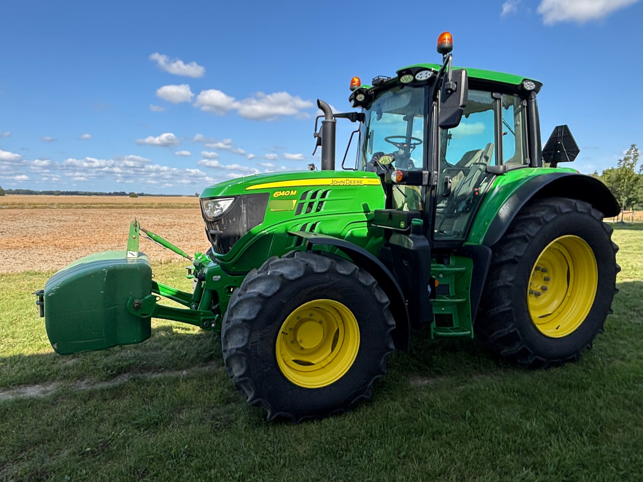 John Deere 6140M - Traktor: das Bild 1 John Deere 6140M - Traktor: das Bild 1