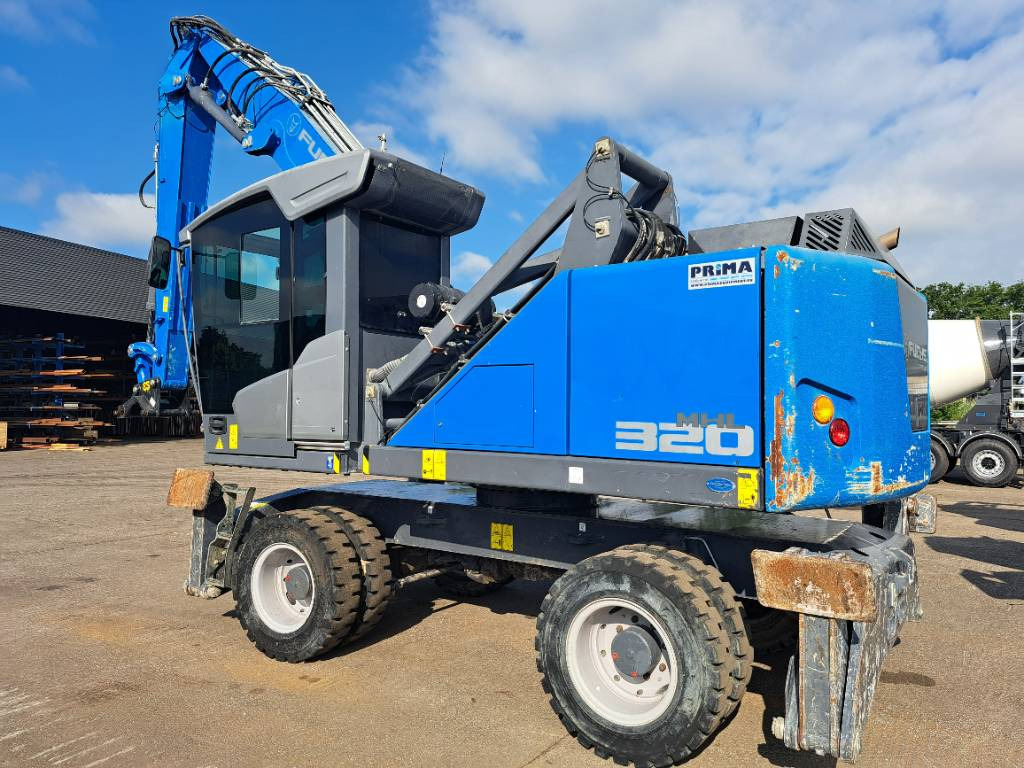 Fuchs MHL320F - Umschlagbagger: das Bild 1 Fuchs MHL320F - Umschlagbagger: das Bild 1