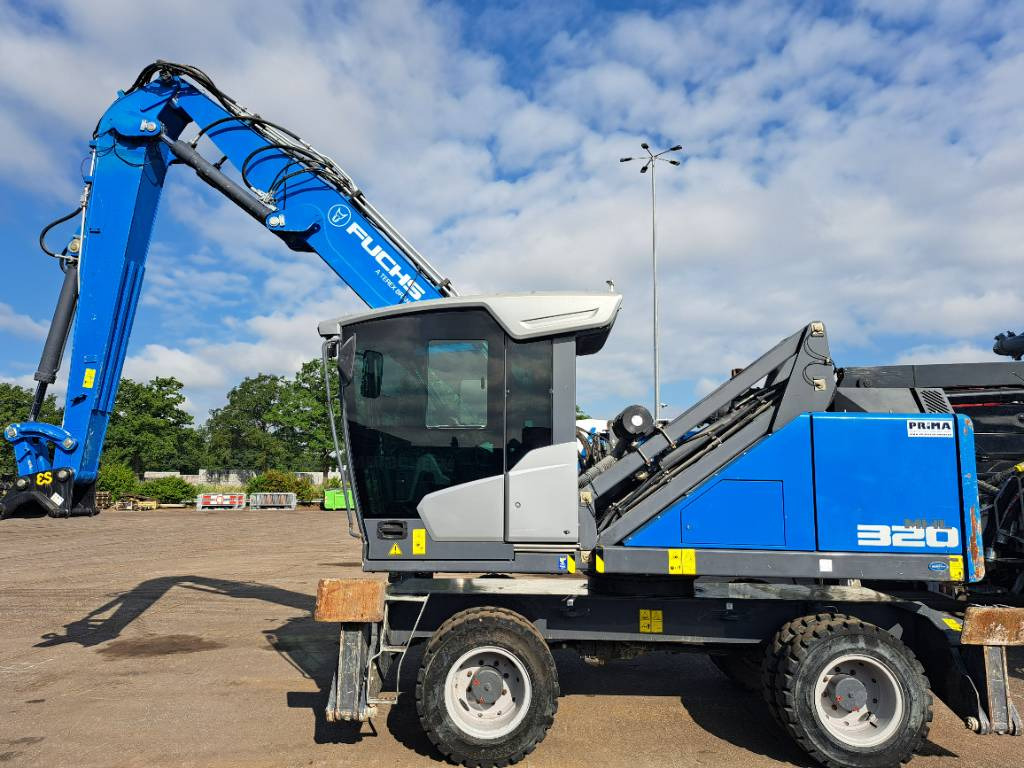 Fuchs MHL320F - Umschlagbagger: das Bild 2 Fuchs MHL320F - Umschlagbagger: das Bild 2