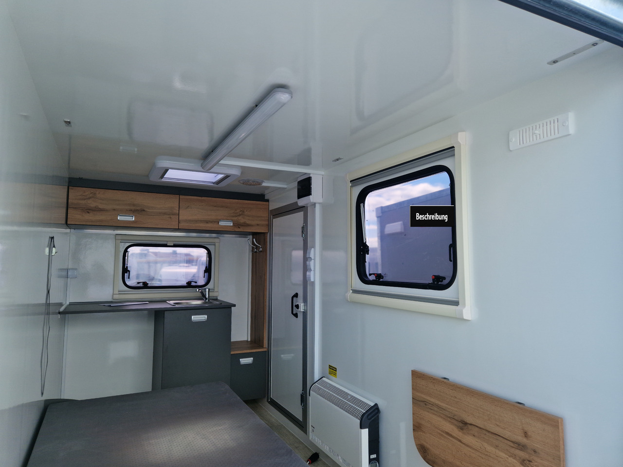 Koffer Camp TFS ST 320.01 320x150x180cm Premium Rampe Seitentür Fenster Bett 1300kg 100km/H - Wohnwagen: das Bild 5 Koffer Camp TFS ST 320.01 320x150x180cm Premium Rampe Seitentür Fenster Bett 1300kg 100km/H - Wohnwagen: das Bild 5