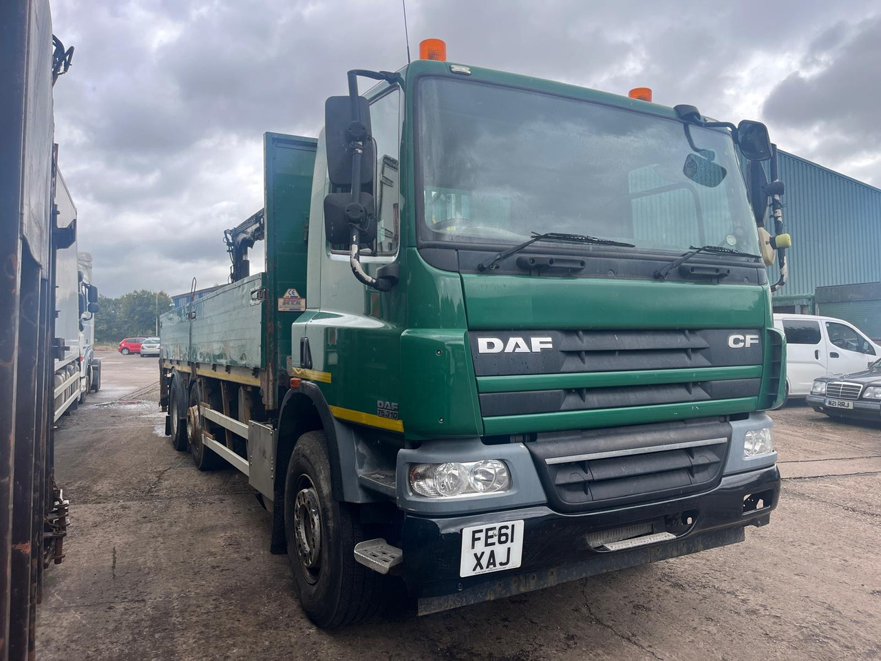 DAF CF 75 310 - Pritsche LKW, Autokran: das Bild 1 DAF CF 75 310 - Pritsche LKW, Autokran: das Bild 1