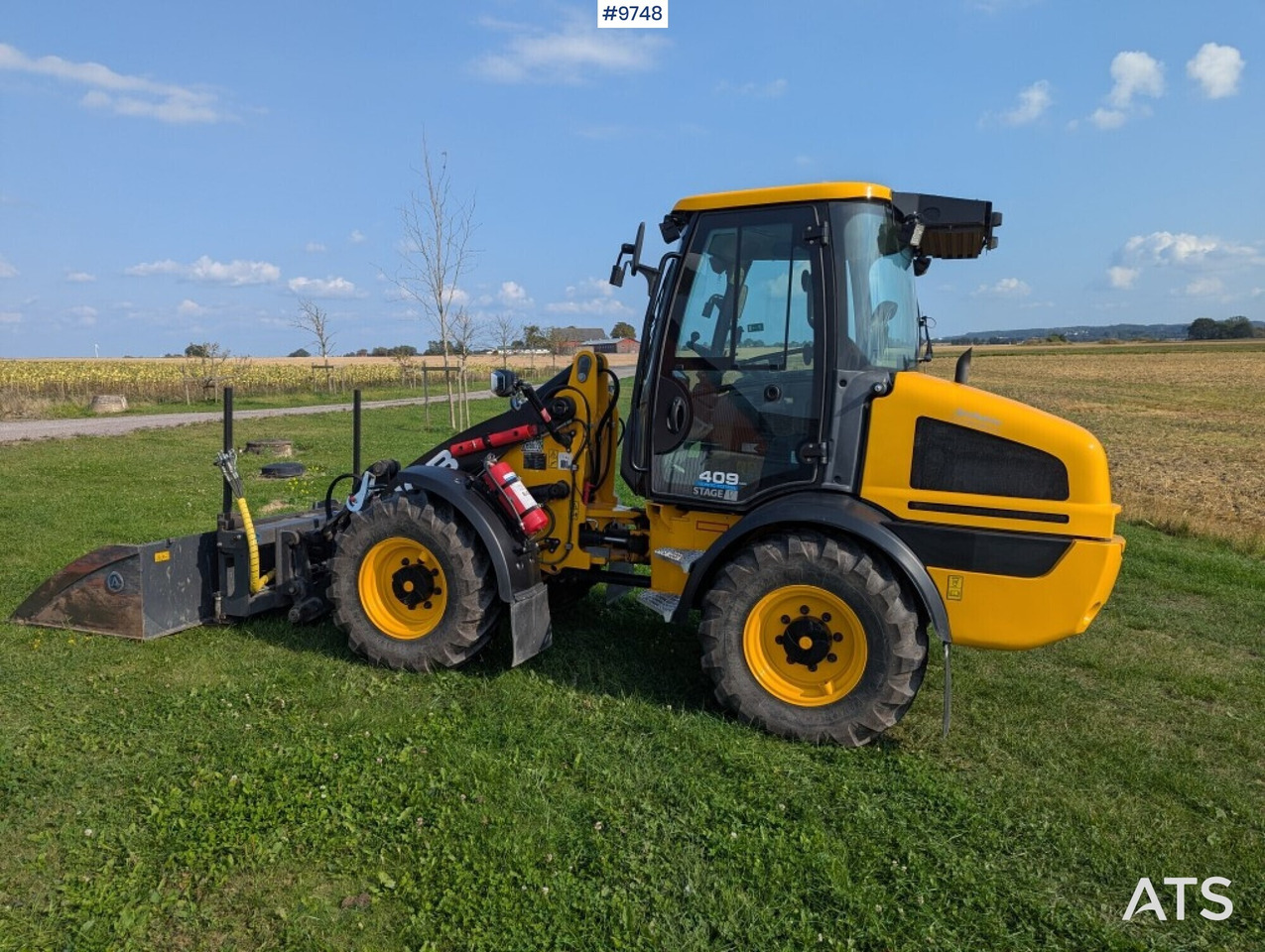 Wheel loader JCB 409 Stage V Nordic Edition 40km/h with attachments - Radlader: das Bild 4 Wheel loader JCB 409 Stage V Nordic Edition 40km/h with attachments - Radlader: das Bild 4