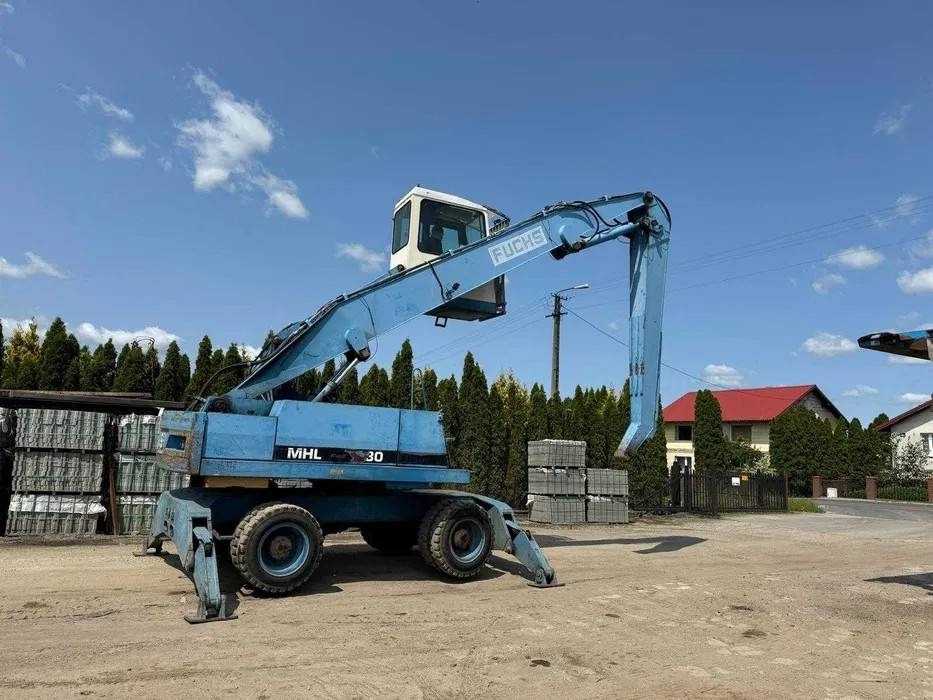 Koparka przeładunkowa Fuchs MHL 330 - Umschlagbagger: das Bild 1 Koparka przeładunkowa Fuchs MHL 330 - Umschlagbagger: das Bild 1