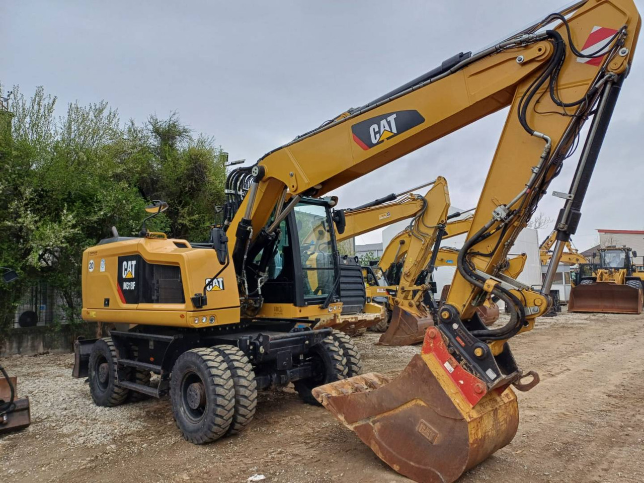 CAT M318F - Mobilbagger: das Bild 2 CAT M318F - Mobilbagger: das Bild 2