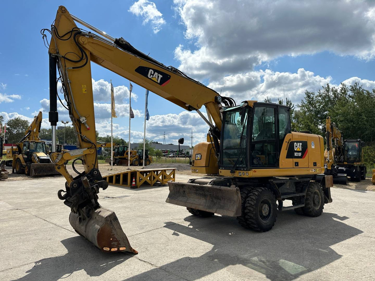 CAT M318F - Mobilbagger: das Bild 1 CAT M318F - Mobilbagger: das Bild 1