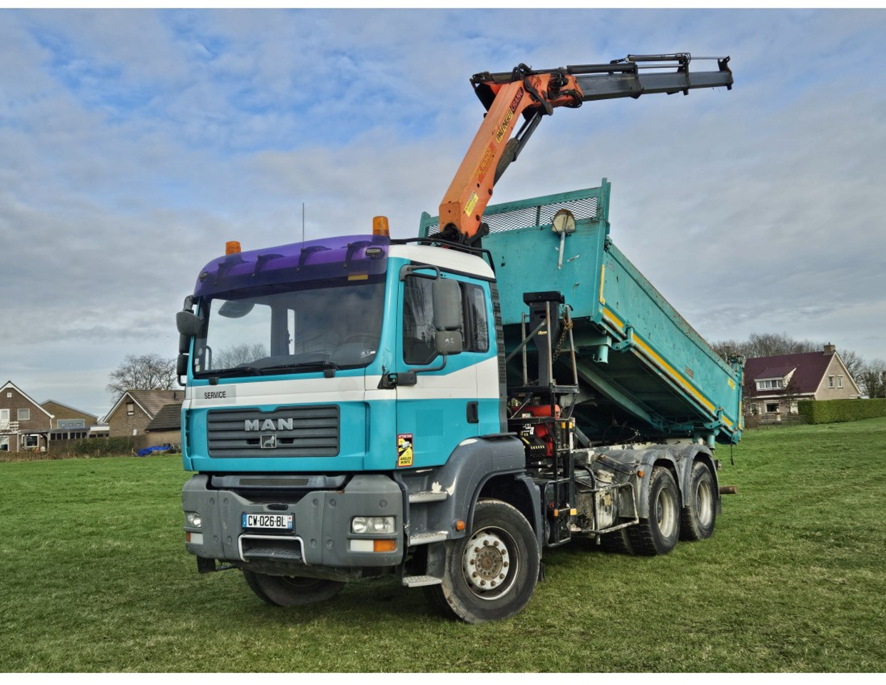 MAN TGA 33.360 TIPPER 3 SIDE CRANE PALFINGER 16502 *REMOTE CONTROL - Kipper: das Bild 1 MAN TGA 33.360 TIPPER 3 SIDE CRANE PALFINGER 16502 *REMOTE CONTROL - Kipper: das Bild 1