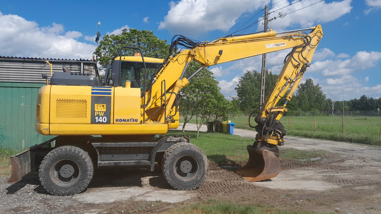 KOMATSU PW 140-7 - Mobilbagger: das Bild 1 KOMATSU PW 140-7 - Mobilbagger: das Bild 1