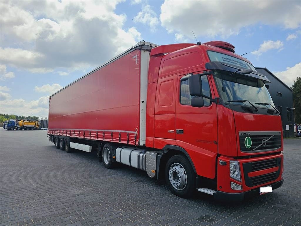 Volvo FH13 XXL EURO 5 2011 + KRONE MEGA RAISE - Sattelzugmaschine: das Bild 2 Volvo FH13 XXL EURO 5 2011 + KRONE MEGA RAISE - Sattelzugmaschine: das Bild 2