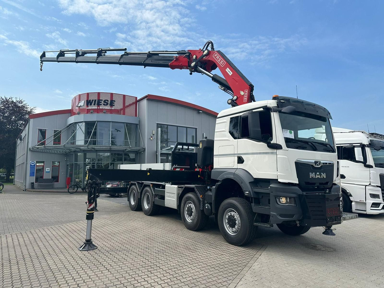 MAN TGS 41.520 8x8 mit Fassi Ladekran F710RA.2.26 - Autokran: das Bild 1 MAN TGS 41.520 8x8 mit Fassi Ladekran F710RA.2.26 - Autokran: das Bild 1