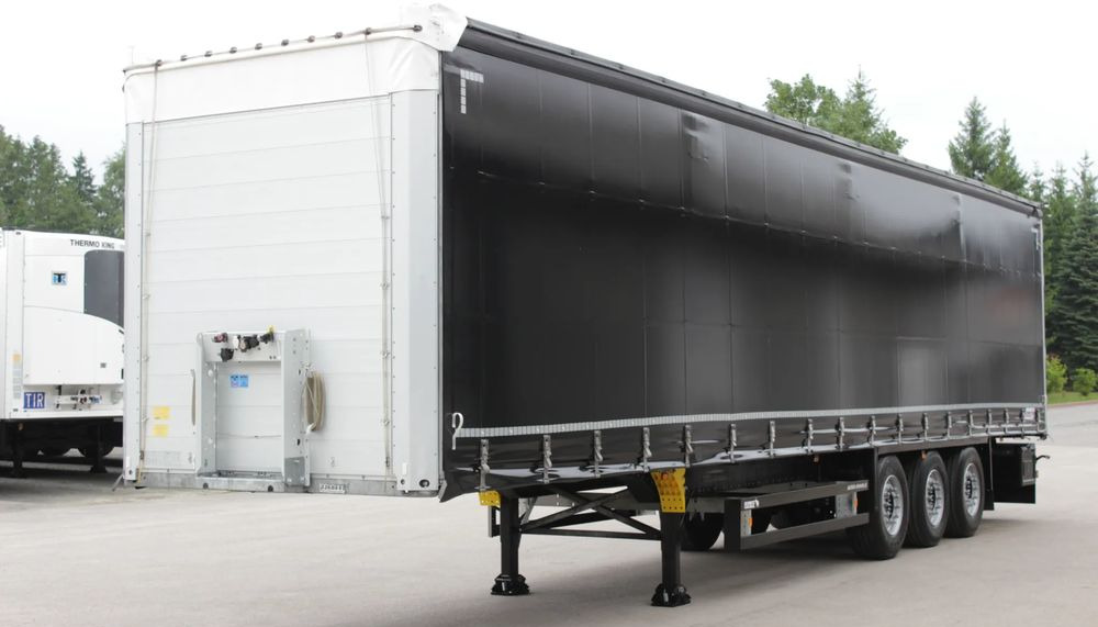 Schmitz Cargobull FIRANA / STANDARD / OŚ PODNOSZONA / MULTILOCK / Certyfikat XL / JAK NOWA / - Kühlkoffer Auflieger: das Bild 3 Schmitz Cargobull FIRANA / STANDARD / OŚ PODNOSZONA / MULTILOCK / Certyfikat XL / JAK NOWA / - Kühlkoffer Auflieger: das Bild 3
