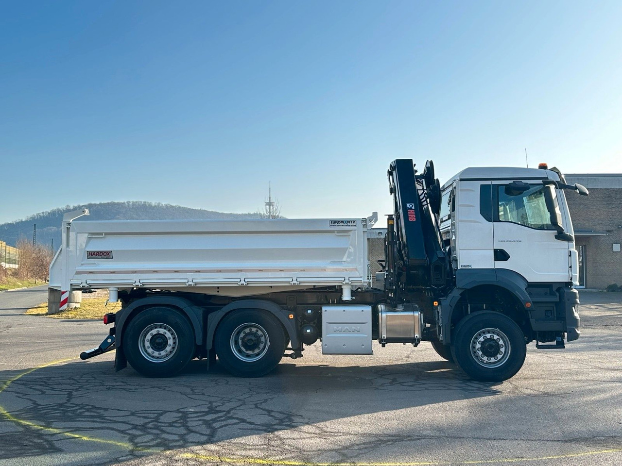 MAN TGS 28.440 6x4-4/3-Seiten- Kipper / Hiab 228-6 - Kipper, Autokran: das Bild 5 MAN TGS 28.440 6x4-4/3-Seiten- Kipper / Hiab 228-6 - Kipper, Autokran: das Bild 5
