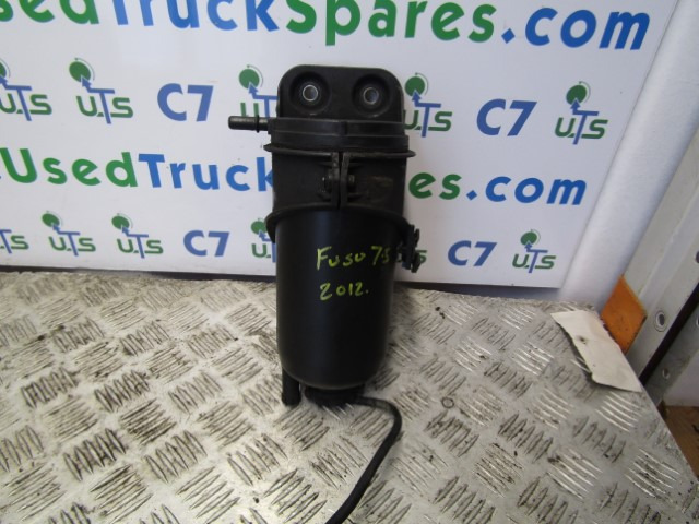MITSUBISHI FUSO / CANTER FUEL FILTER HOUSING MK666099 - Motor und Teile für LKW: das Bild 1 MITSUBISHI FUSO / CANTER FUEL FILTER HOUSING MK666099 - Motor und Teile für LKW: das Bild 1