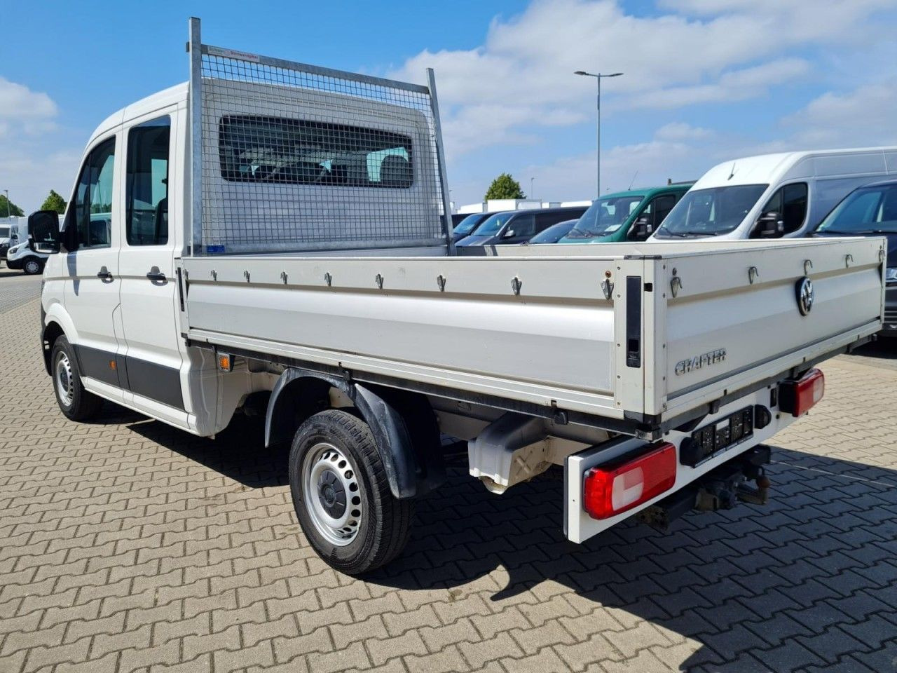 Volkswagen Crafter 35 Doka MR 7-Sitze AHK KLIMA KOMFORT - Pritsche Transporter: das Bild 4 Volkswagen Crafter 35 Doka MR 7-Sitze AHK KLIMA KOMFORT - Pritsche Transporter: das Bild 4