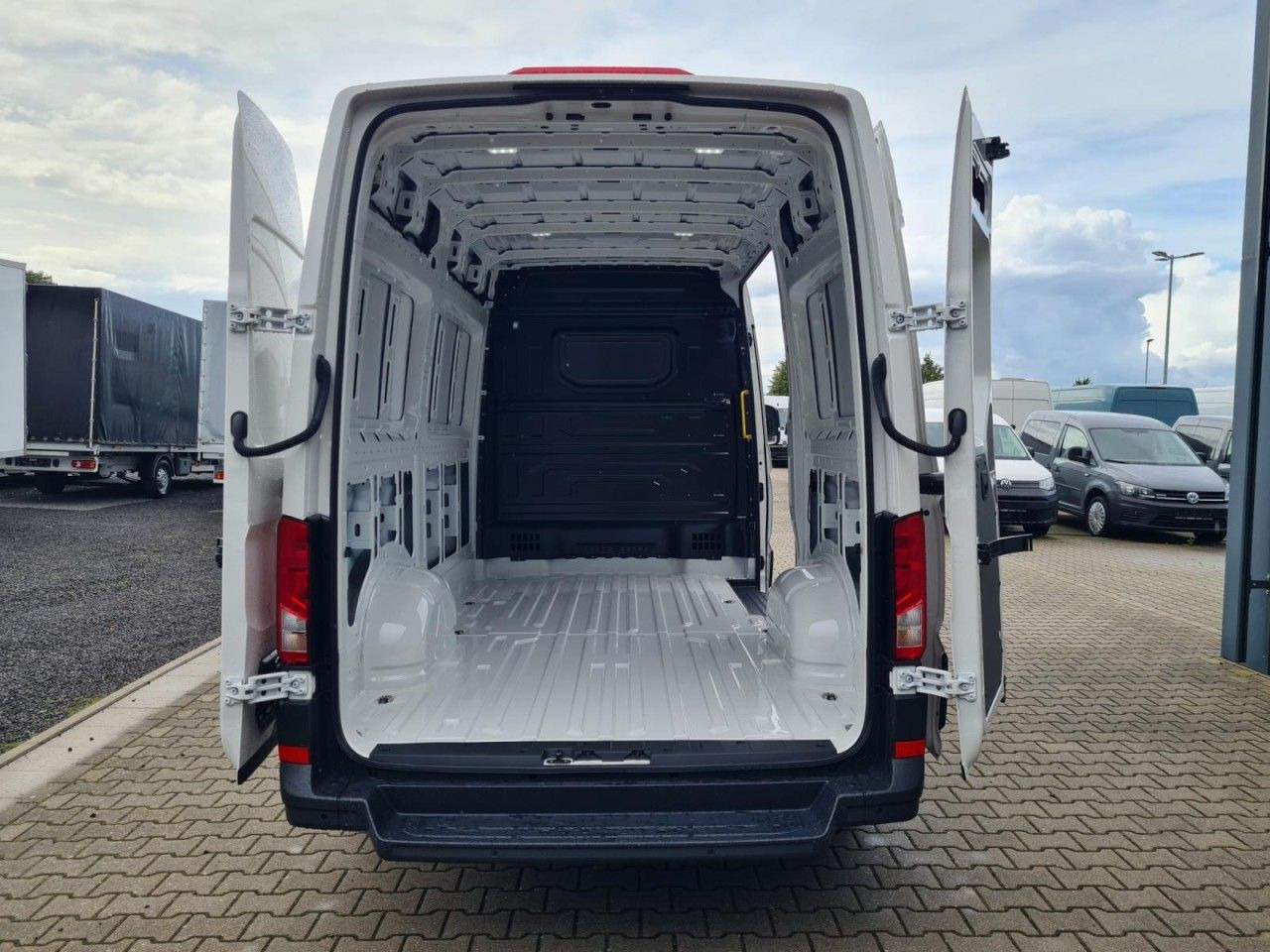 Volkswagen Crafter 35 Kasten TDI MR PDC KLIMA TEMPOMAT - Kastenwagen: das Bild 5 Volkswagen Crafter 35 Kasten TDI MR PDC KLIMA TEMPOMAT - Kastenwagen: das Bild 5