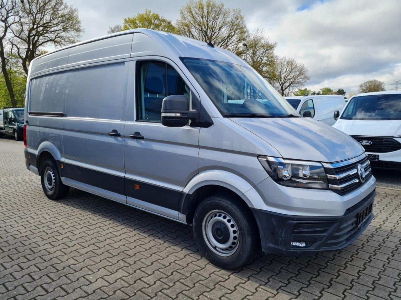 Volkswagen Crafter 35 Kasten TDI MR hoch NAVI KLIMA TEMPOMA - Kastenwagen: das Bild 3 Volkswagen Crafter 35 Kasten TDI MR hoch NAVI KLIMA TEMPOMA - Kastenwagen: das Bild 3