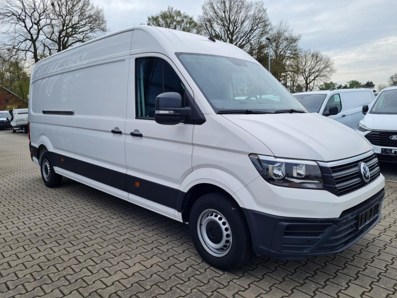 Volkswagen Crafter 35 Kasten lang L4H2 KLIMA NAVI_APP HOLZB - Kastenwagen: das Bild 3 Volkswagen Crafter 35 Kasten lang L4H2 KLIMA NAVI_APP HOLZB - Kastenwagen: das Bild 3