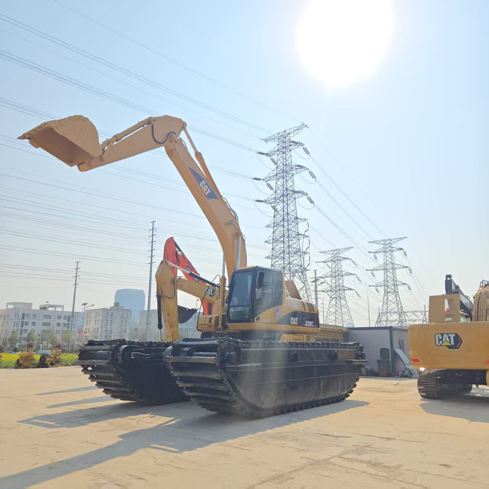 Caterpillar 320C - Amphibische Bagger: das Bild 1 Caterpillar 320C - Amphibische Bagger: das Bild 1